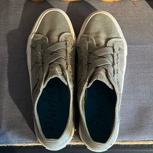 Light green no tie sneakers .